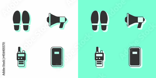 Set Police assault shield, Footsteps, Walkie talkie and Megaphone icon. Vector