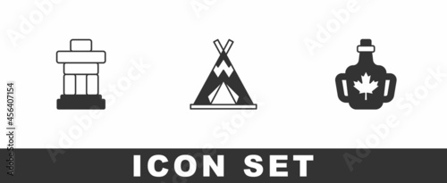 Set Inukshuk, Indian teepee or wigwam and Bottle of maple syrup icon. Vector
