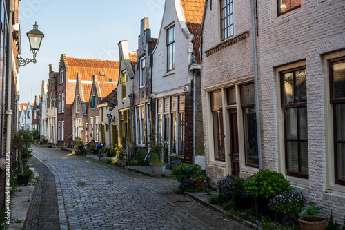 Fototapeta Naklejka Na Ścianę i Meble -  Walking in old Dutch town Zierikzee with old small houses and streets