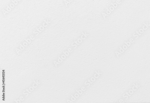 Seamless texture of white old cement wall a rough surface, with space for text, for a background..