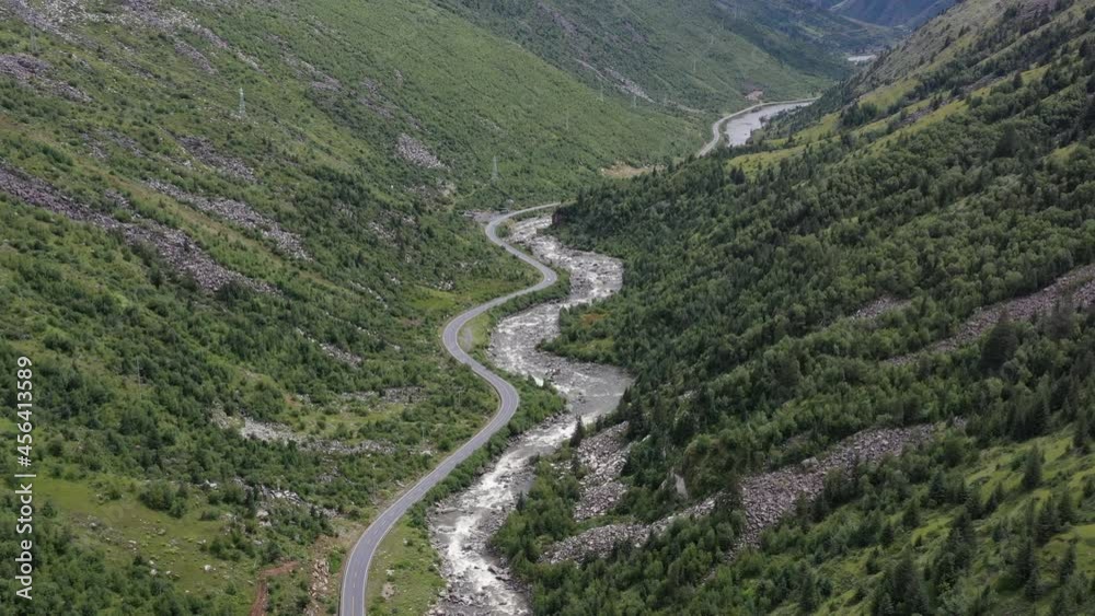 aerial view of the road to mountains
aerial view of the road to mountains