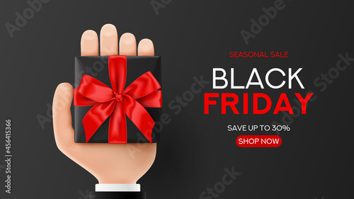 Black Friday sale banner template. Cartoon hand holds black gift box with red bow. Small gift box in man's cartoon hand. Vector illustration with concept of Black Friday symbol. photo