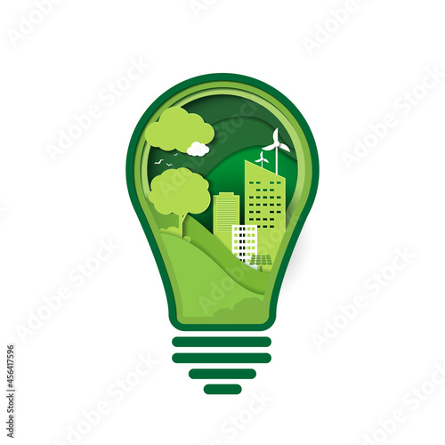 Paper art of green ecology technology and nature concept. save energy creative idea concept. light bulb with nature and environment conservation. vector design