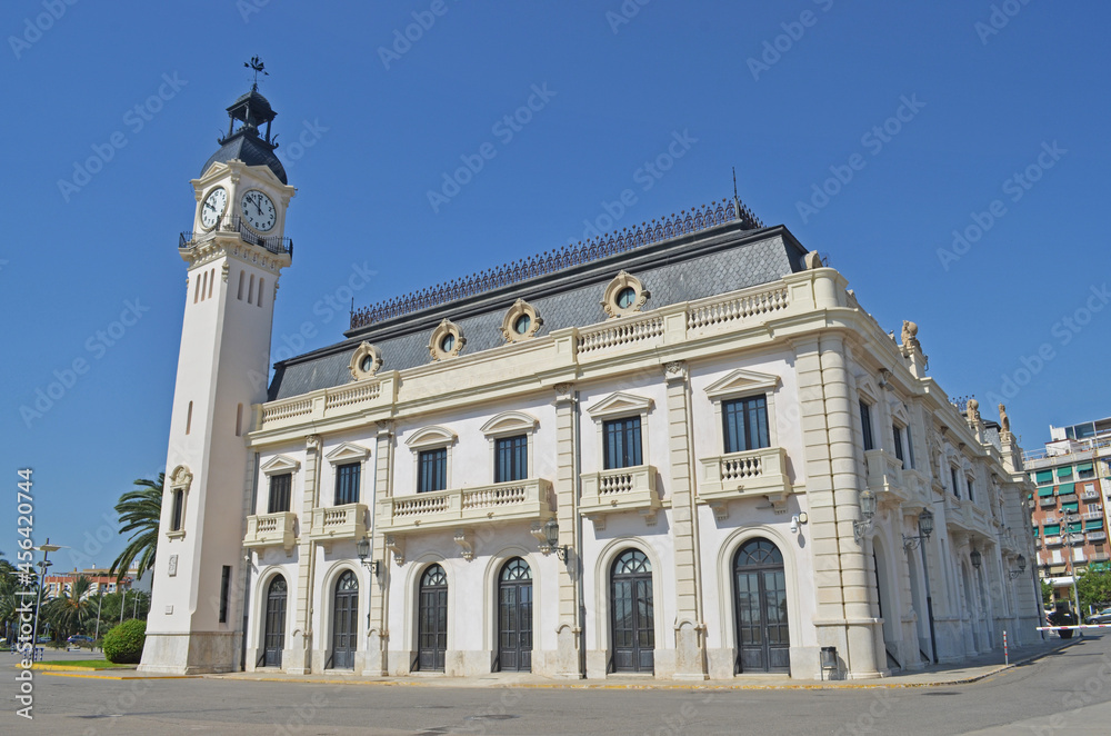 white historic building with clock tower