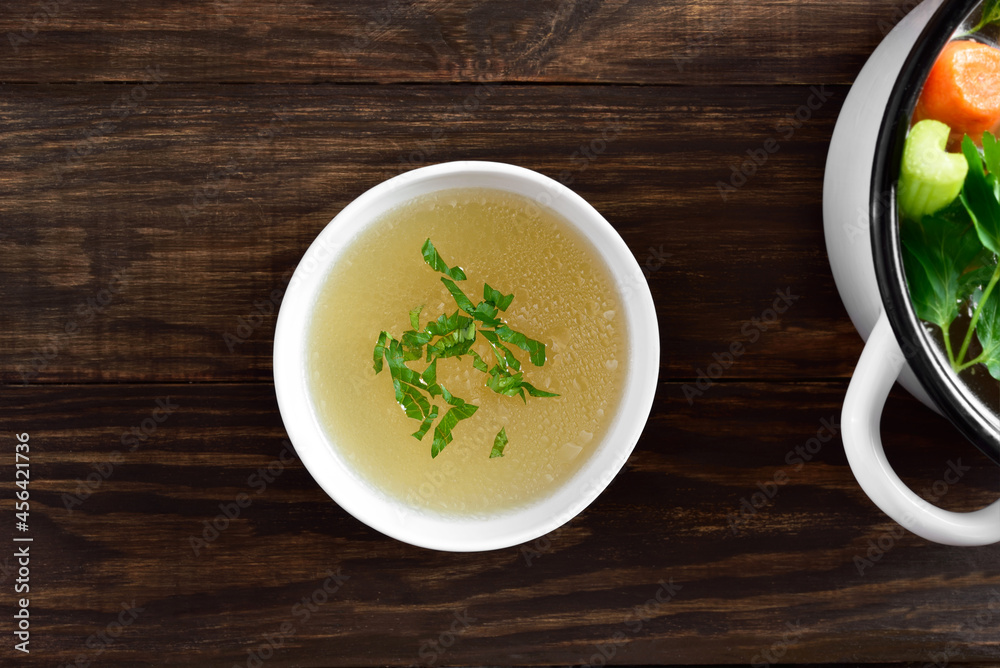 Chicken broth with vegetables and spices Chicken broth with vegetables and spices