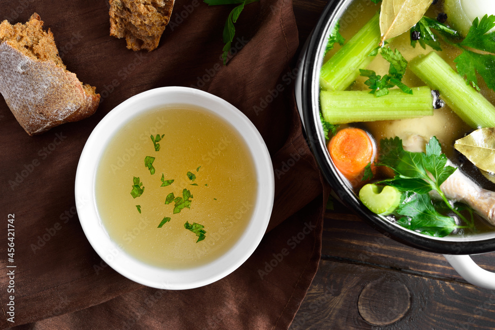 Chicken broth with vegetables and spices Chicken broth with vegetables and spices