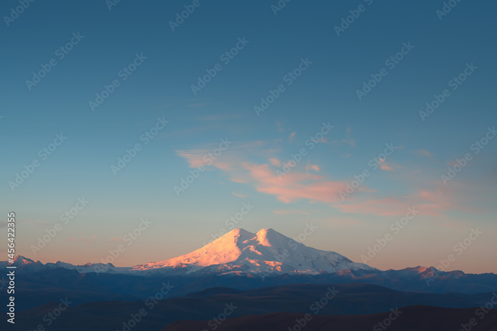 View of Elbrus mount at sunrise from Gil-Su valley in North Caucasus, Russia. Beautiful autumn landscape