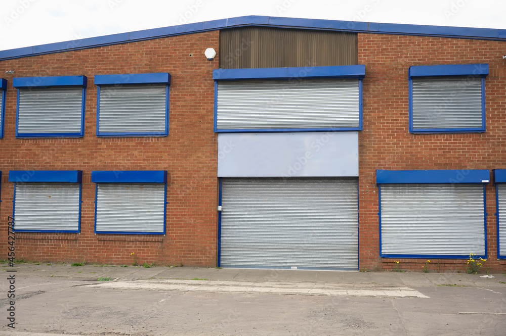 Office window shutters closed due to business closure Office window shutters closed due to business closure