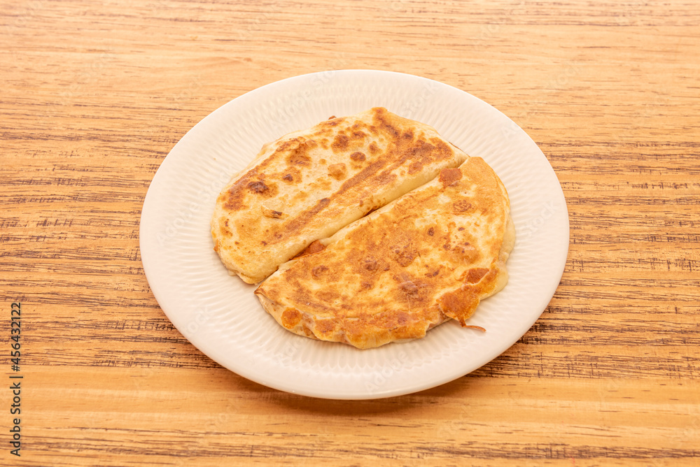 Synchronized Mexican ham and cheese quesadillas