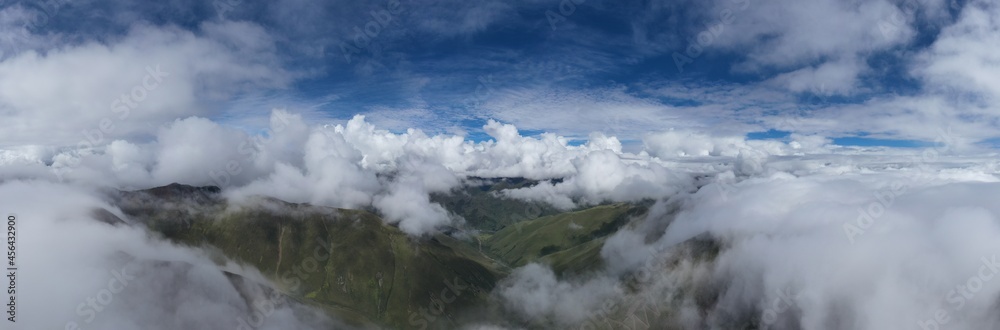 aerial view of the mountain with clouds