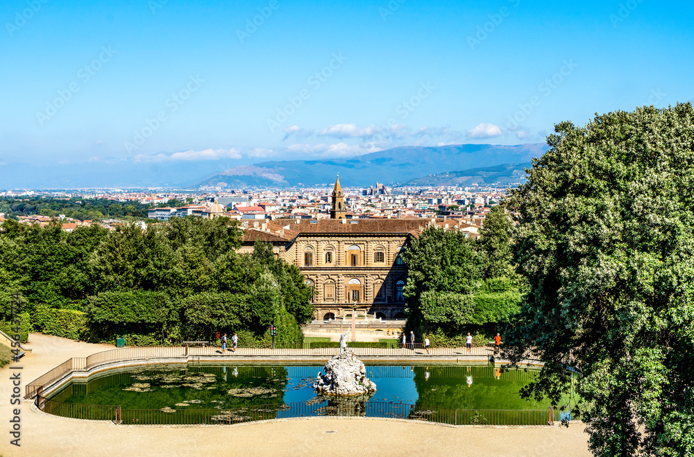 View of the Boboli Gardens, with the back façade of Pitti palace, Florence in the background,  Florence city center, Tuscany region, Italy