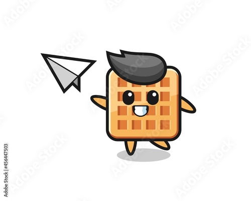 waffle cartoon character throwing paper airplane