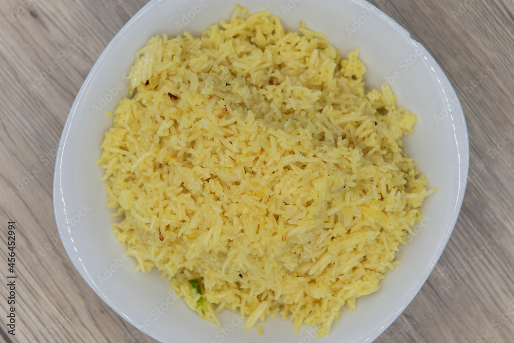 Overhead view of delicious side dish of biryani rice from Indian restaurant cooked and seasoned perfectly Overhead view of delicious side dish of biryani rice from Indian restaurant cooked and seasoned perfectly