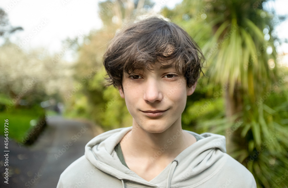 portrait of teenager boy on natural background portrait of teenager boy on natural background