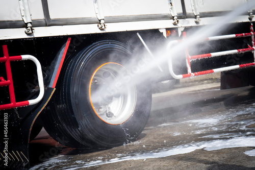 High Pressured Water Washing  a Truck Wheels and Tires. 