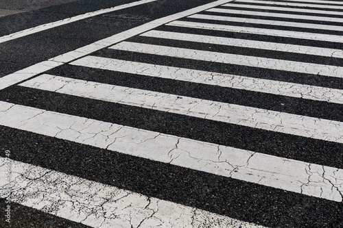 A zebra crossing on the street.