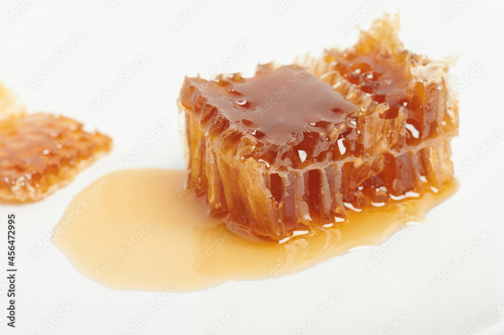 Honey with propolis on plate