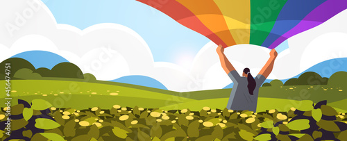 woman holding lgbt rainbow flag gay lesbian love parade pride festival transgender love concept
