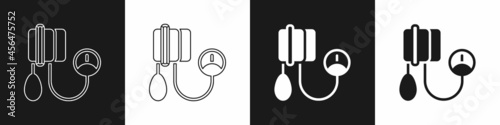 Set Blood pressure icon isolated on black and white background. Vector