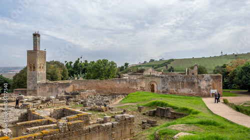 Rabat, Morocco – December 09, 2015 – View of the ruins of the medieval fortified Muslim necropolis of Chellah. The site, as part of the metropolitan Rabat, was granted World Heritage Status in 2012 photo