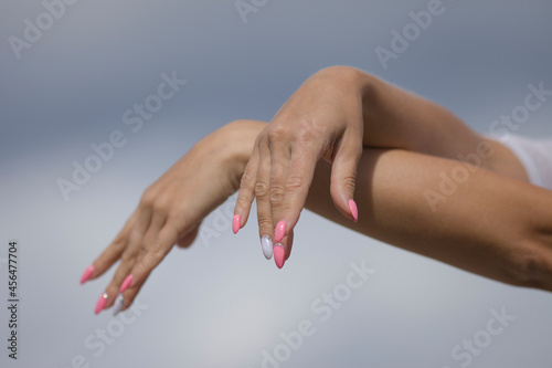 female hands with manicure on nails