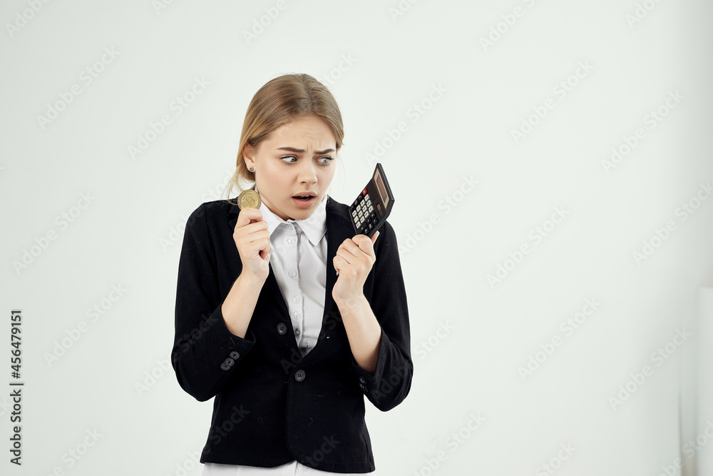 Business woman with calculator and coin Bitcoin finance economy Business woman with calculator and coin Bitcoin finance economy