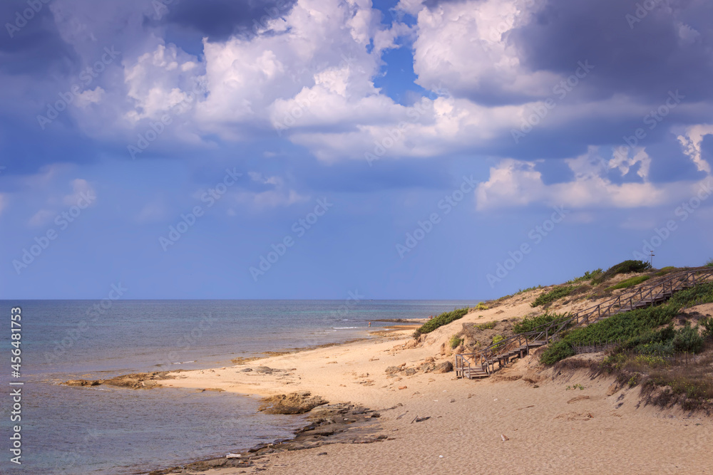 The most beautiful beaches of Italy: Campomarino dune park in Apulia, Italy. The protected area extends along the entire coast of the town of Maruggio.	