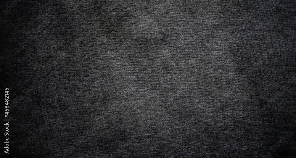 Photo of a black textile texture. A clean place for the text. Photo of a black textile texture. A clean place for the text.