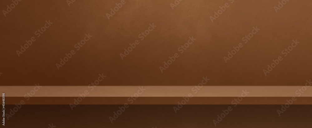 Empty shelf on a brown wall. Background template. Horizontal banner Empty shelf on a brown wall. Background template. Horizontal banner
