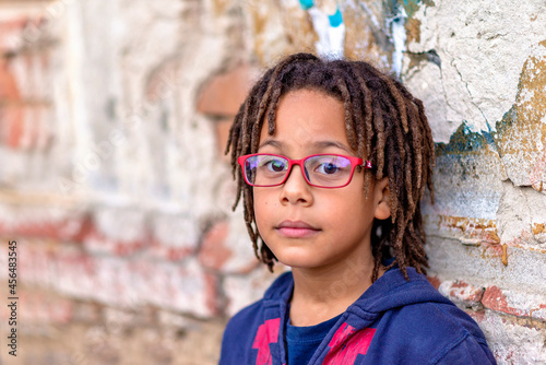close up portrait of a cute African American boy with eyeglasses