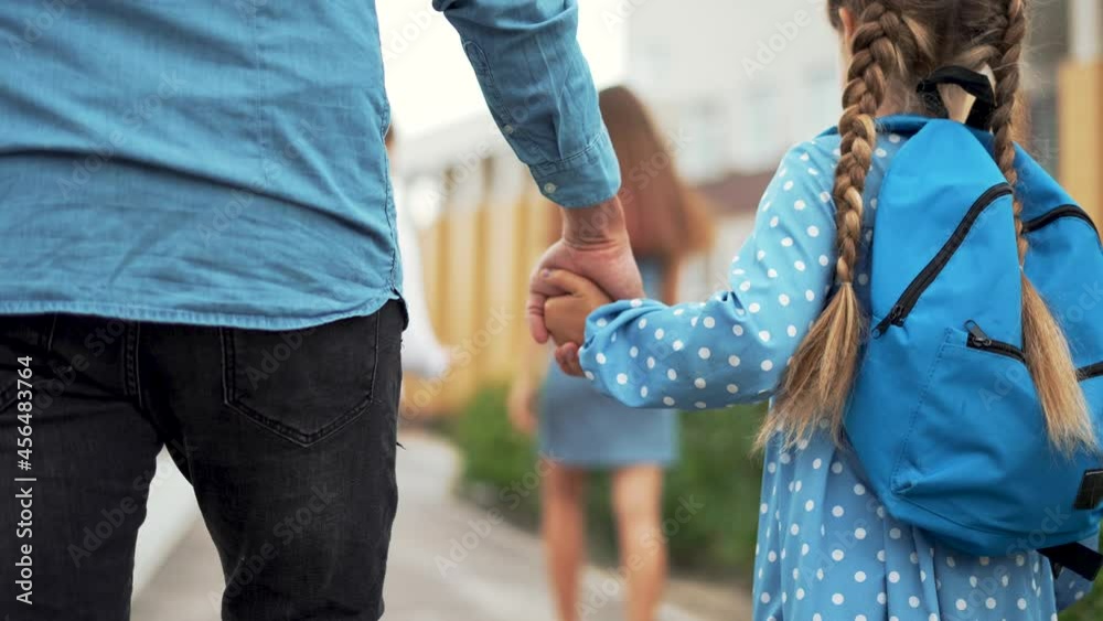 Happy family. Father and daughter go to school. Schoolgirl with ...