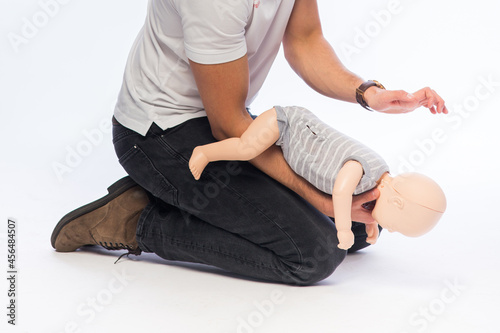 Demonstration of first aid on a baby dummy.  photo