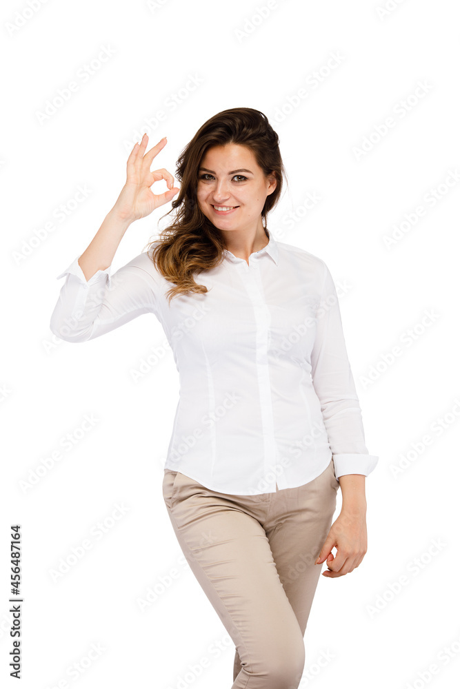 Woman showing OK sign isolated on white background
Woman showing OK sign isolated on white background