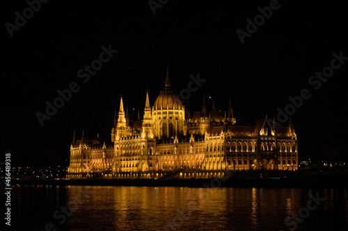 Beautiful building of Parliament in Budapest, Hungary, a popular travel destination at night © Nikolett