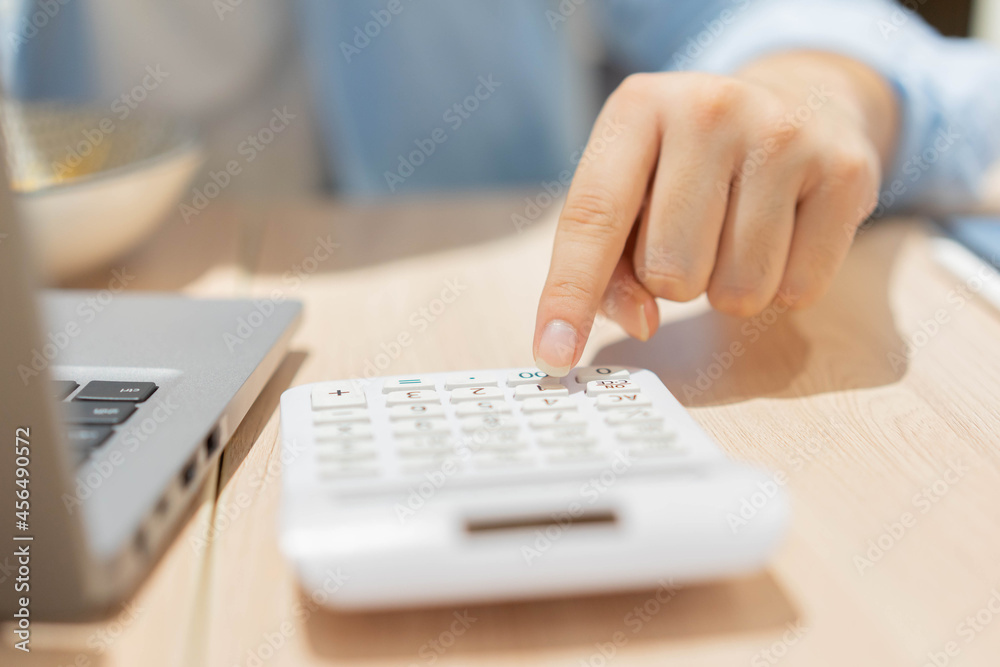 slow motion accounting man hand pressing on calculator for calculate about monthly profit of business for senior accountant job working concept slow motion accounting man hand pressing on calculator for calculate about monthly profit of business for senior accountant job working concept