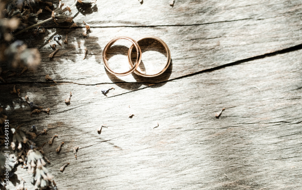 wedding rings on a wooden background wedding rings on a wooden background
