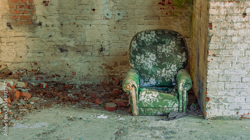 Urbex. Armchair in abandoned brickyard.