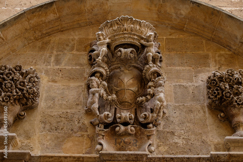 escudo con la cruz de Malta, Sant Felip Neri, iglesia gótica del siglo XIII fue sustituida por un templo barroco empezado en 1618, palma, Mallorca, balearic islands, Spain photo