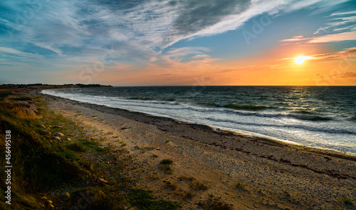 Photography seascape, sea panorama. Evening sea, sunset, dunes and hills, beautiful coast and waves. Seascape, evening seascape,