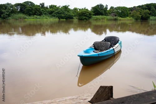 canoe boat floating on river