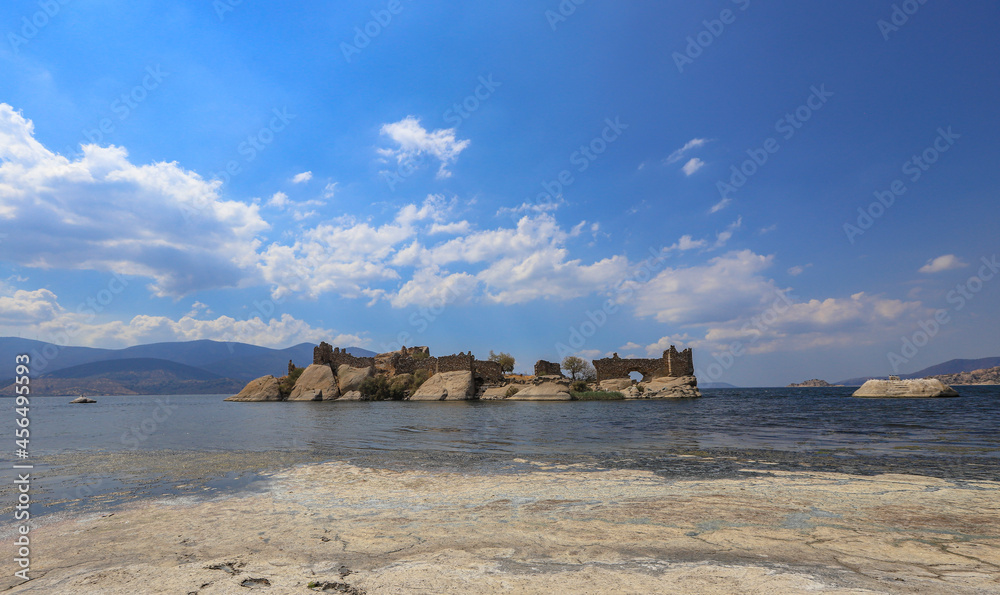 Island with ancient fortifications in Kapikiri village on Bafa lake in Mugla, Turkey.