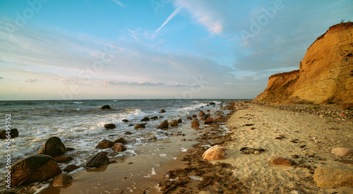 Photo sea, day landscape, dunes, cape. Day photography, warm summer day, dunes, grass by the sea, cape.