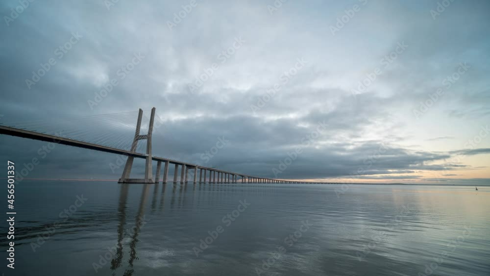 4k time lapse of sunrise with clouds at the Ponte Vasco de Gama in Lisbon, Portugal 4k time lapse of sunrise with clouds at the Ponte Vasco de Gama in Lisbon, Portugal