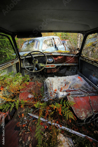 Photography Old cars forgotten into Finnish countryside.