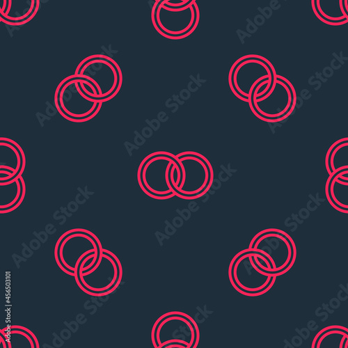 Red line Wedding rings icon isolated seamless pattern on black background. Bride and groom jewelry sign. Marriage symbol. Diamond ring. Vector
