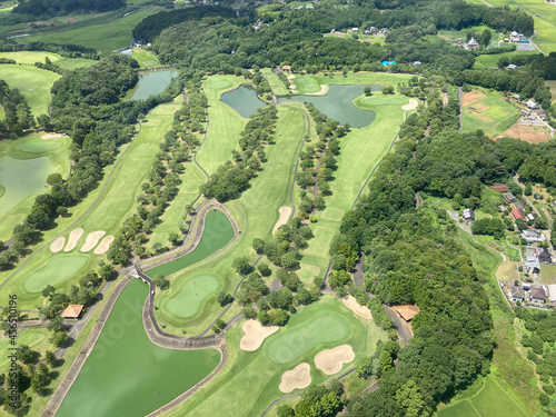 View of a Golf Course in the Countryside from Helicopter