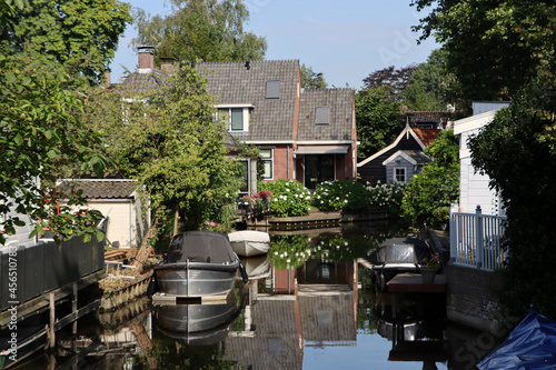 Authentic Dutch architecture. Traditional buildings of the Netherlands. Cute town street view photo. Summer in Europe. 