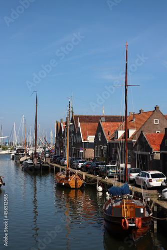 Beautiful Dutch city on water. Classic Dutch architecture. Sunny day city view. Authentic houses of the Netherlands. 