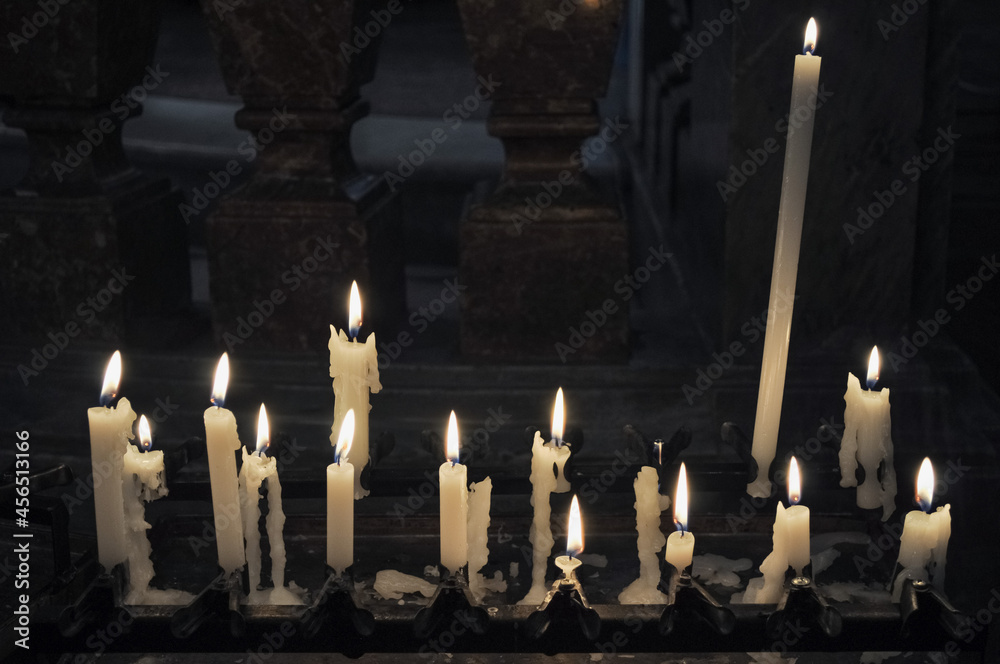 lit candles in a church lit candles in a church
