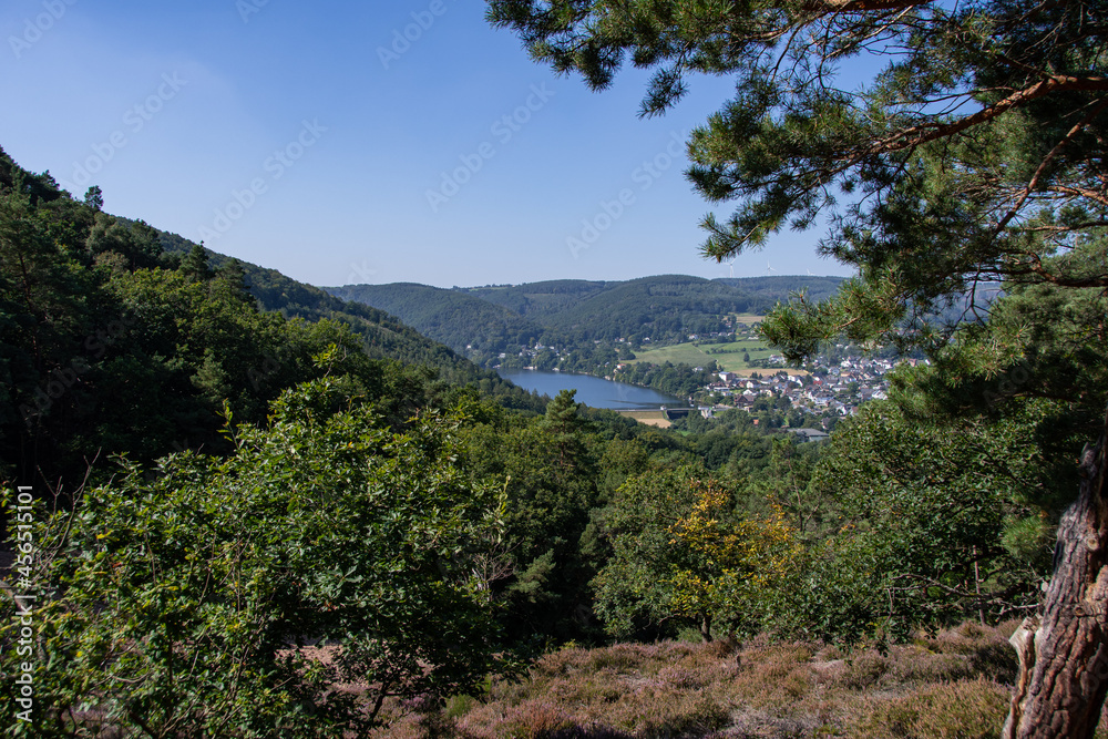 The view from the Engelsblick viewpoint of Obermaubach and the dam